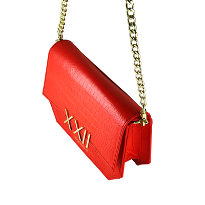 women's designer orange & gold handbag  