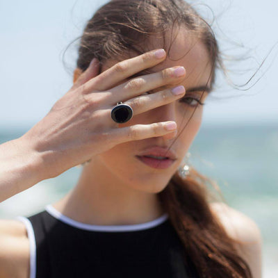 Model wearing Sophie Blake onyx 14k gold ring